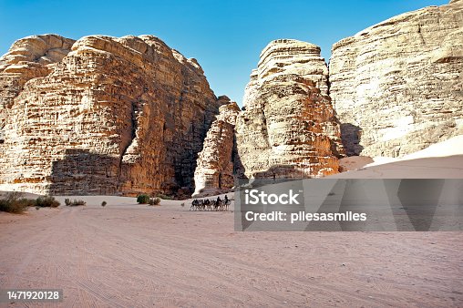istock Camel trains pass in Wadi Rum or Valley of the Moon, Jordan, Middle East 1471920128