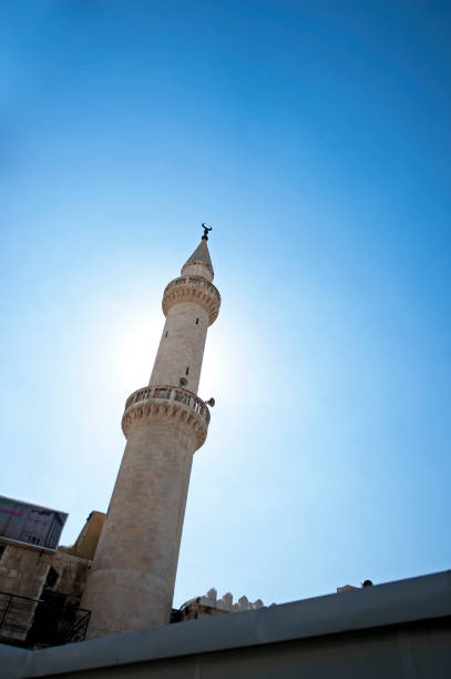 istock Islamic Mosque minarets in silhouette, Amman, Jordan 1471924624