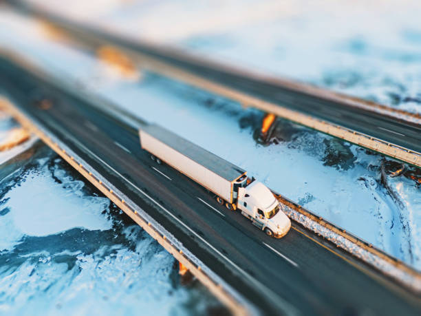 istock Semi Truck Crossing Frozen River 1471926061