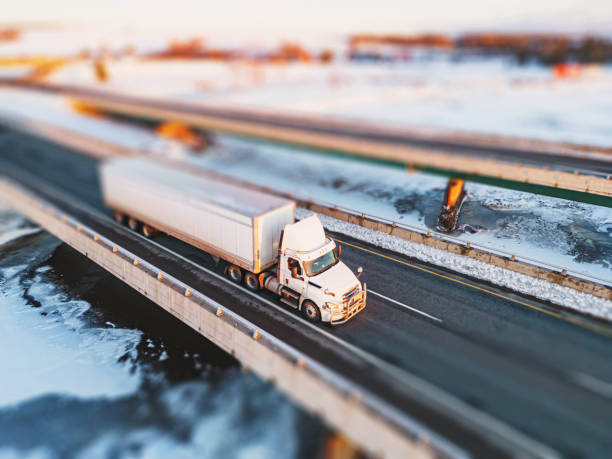 istock Semi Truck Crossing Frozen River 1471926062