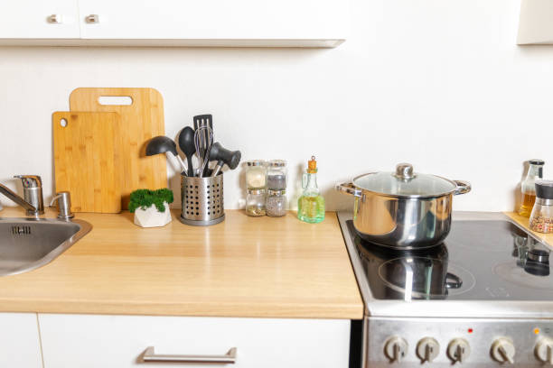 istock Scandinavian classic minimalistic kitchen with white and wooden details. Modern white kitchen clean contemporary style interior design. 1471926853