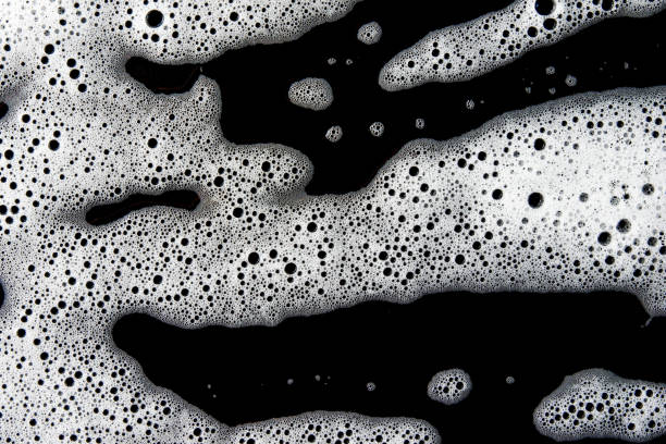 istock Abstract background white soapy foam texture. Shampoo foam with bubbles 1471927609