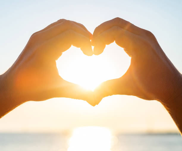 istock Shape of heart made by hands 1471930249