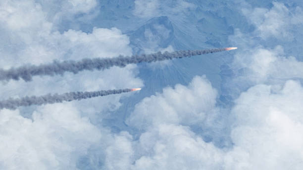 istock Meteors asteroids or rockets burning over cloudsAerial view 1471932919