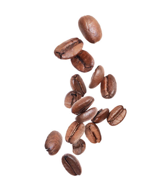 istock Coffee beans in the air isolated on a white background 1471933411