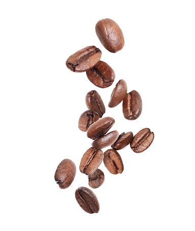 Coffee beans in the air isolated on a white background