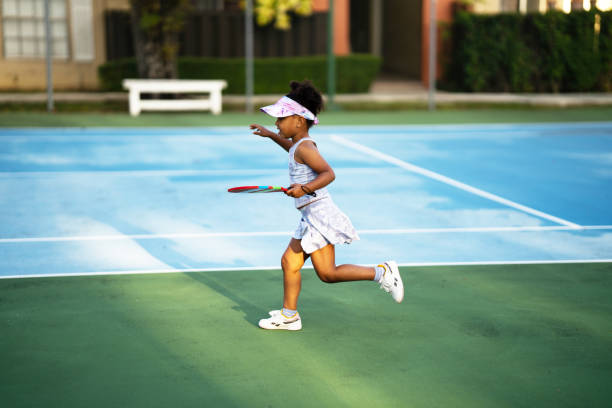 istock Hispanic girl warming up running before  pickle ball practice 1471934062