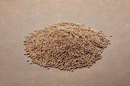 Top View Of Green Lentils On Brown