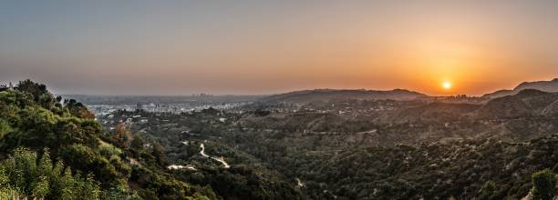 Los Angeles sunset (view from Griffith Observatory) Sunset at Los Angeles, California, USA. View from Griffith Observatory. griffith park observatory stock pictures, royalty-free photos & images