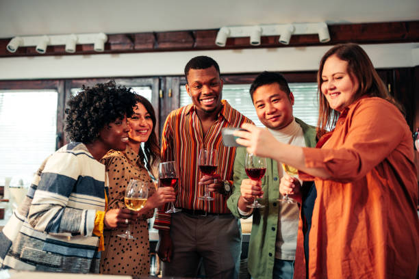istock People looking at cellphone. 1471938719
