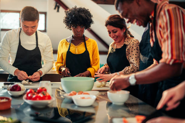 istock Friends bonding in cooking class. 1471938970