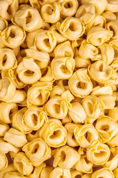 istock Raw fresh tortellini pasta isolated on white background 1471939091