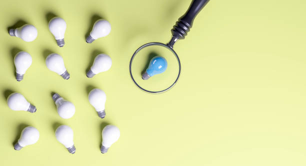 istock Blue Bulb Standing Out From The Crowd 1471939128