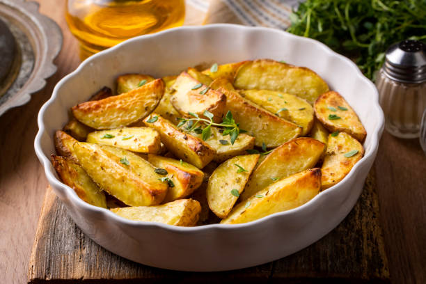 istock Baked spiced potatoes look delicious. 1471940213