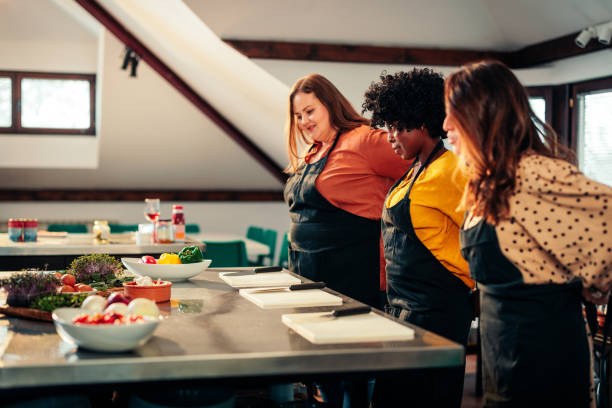 istock Cheerful girls preparing to cook. 1471940727