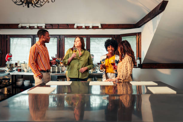 istock Cheerful friends enjoying conversation at cooking class. 1471940781
