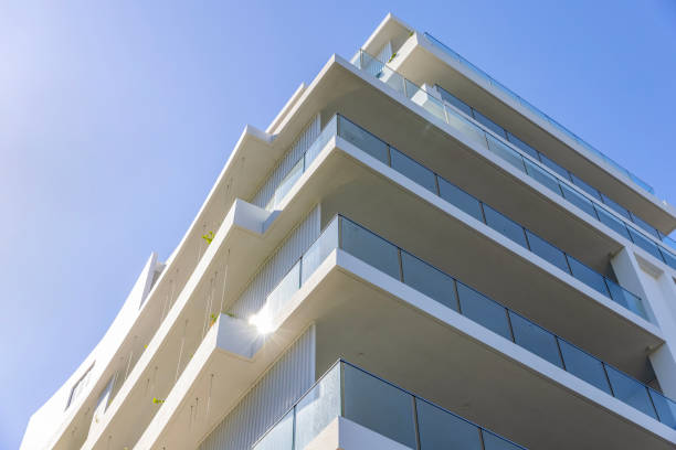 istock Closeup new, modern apartment building, background with copy space 1471946738