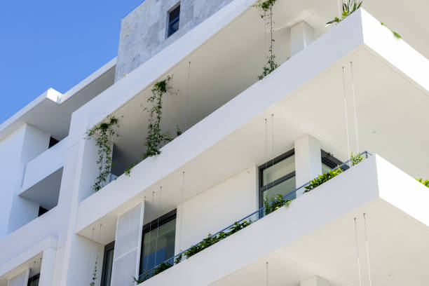 istock Closeup new, modern apartment building, background with copy space 1471949376