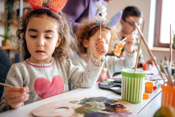 istock Multi-Generation Family preparing decoration for Easter holiday together at home 1471950483