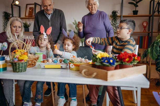 istock Multi-Generation Family preparing decoration for Easter holiday together at home 1471950509