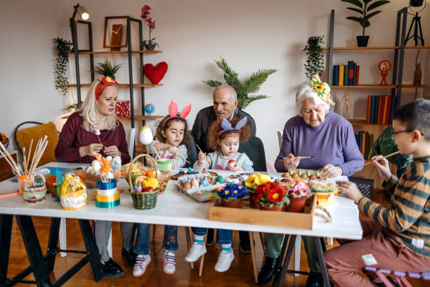 istock Multi-Generation Family preparing decoration for Easter holiday together at home 1471950600