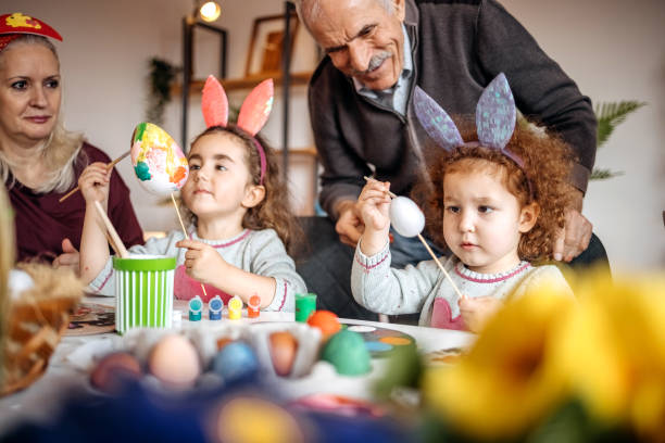istock Multi-Generation Family preparing decoration for Easter holiday together at home 1471950771