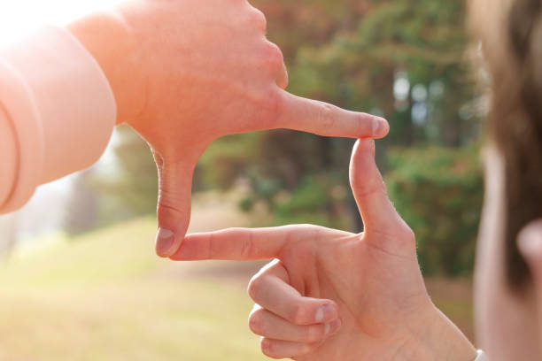 istock Fingers framing beautiful nature on hiking 1471950839