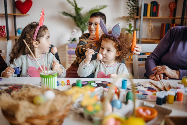 istock Multi-Generation Family preparing decoration for Easter holiday together at home 1471950932