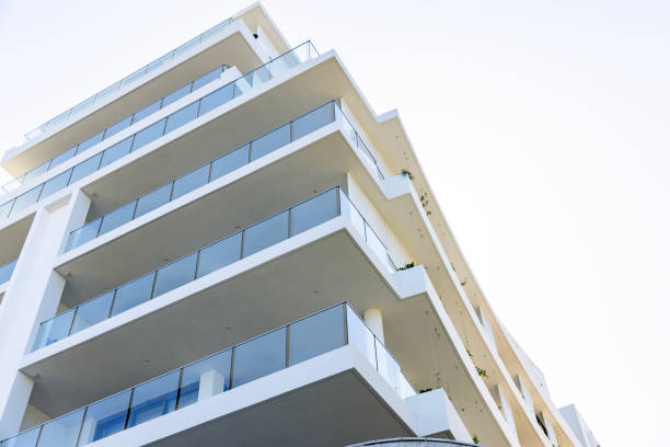 istock Closeup new, modern apartment building, background with copy space 1471953734
