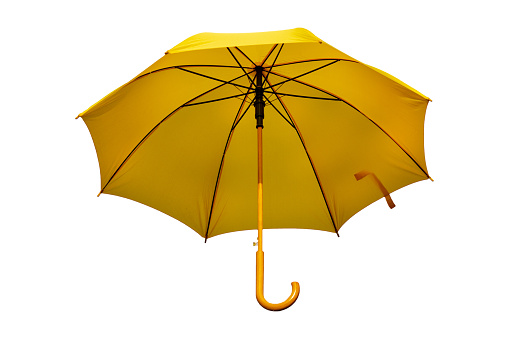 Yellow umbrella isolated on a white background.