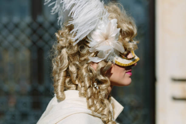 Beautiful senior woman dancing in fancy dress for Carnival in delft