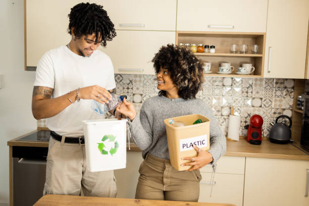 istock Wife and husband collecting plastic waste from home for recycling 1471965677
