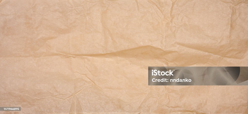 Crumpled Brown Parchment Paper Close Up Stock Photo - Download