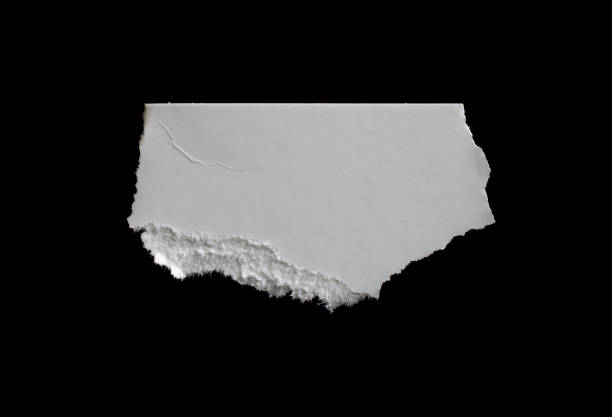 istock a white piece of paper on a black isolated background 1471967767