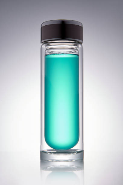 istock Green liquid with clear glass lid 1471971884