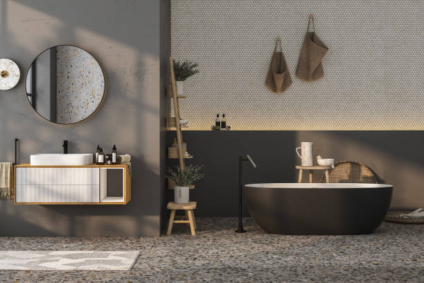 istock Modern minimalist bathroom interior, modern bathroom cabinet, white sink, wooden vanity, interior plants, bathroom accessories, bathtub, dark gray wall, terrazzo flooring. 3d rendering 1471973184