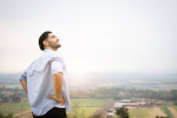istock Man relaxing with a beautiful landscape. 1471976415
