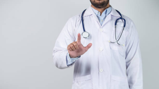 istock male doctor is holding stethoscope into the camera 1471979317
