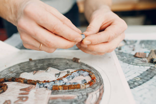 istock Materials sketch and tools for making colored smalt glass mosaics. Master class making mosaic woman ancient greek portrait 1471980340