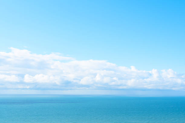 istock Nature background with blue sea against cloudy sky 1471980507