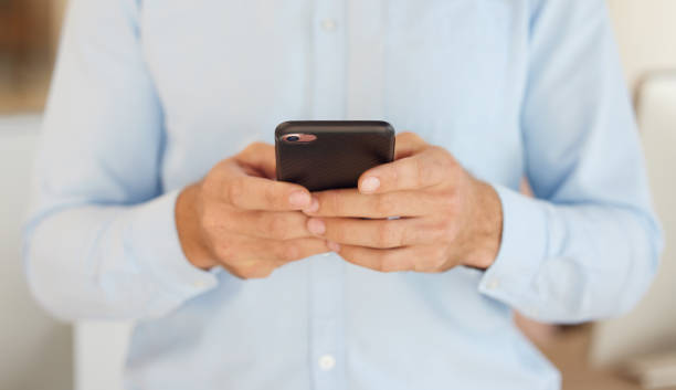 istock Hands, using phone and businessman with texting, closeup and social media app for digital networking on web. Smartphone, chat and man in office, mobile and typing on social network, email or internet 1471990169