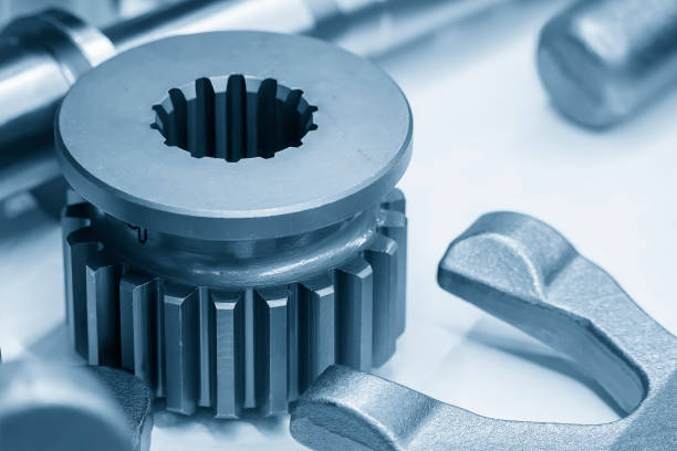 istock The casting metal gear parts in the light blue scene from casting process. 1471995179