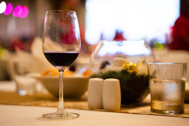 istock Wine glasses on dining table in luxury hotel banquet 1471998783