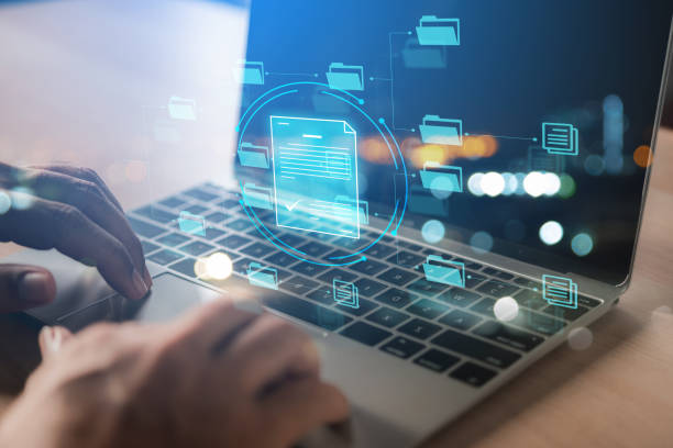 istock business man holding virtual files and folders diagram , manage digital files document with Global Internet connection. Business global internet connection application technology and access information, database, storage, Digital link tech, big data 1471999884