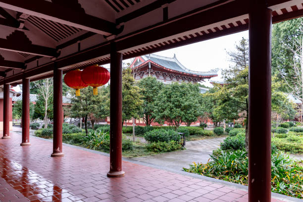 Red lanterns hanging in the temple after the rain