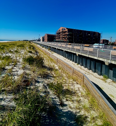 Photograph of a the boardwalk in Long Beach, NY after layers of protection have been installed after super storm sandy.