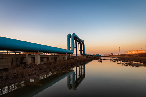 Oil pipeline in the sunset