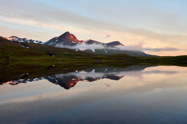 istock Mountains and lake early in morning 1472002804