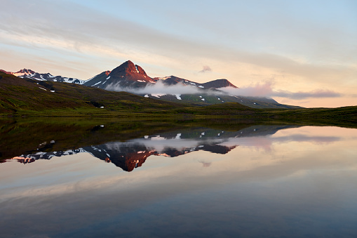 Mountains and lake early in morning in Hvalfjarðarsveit, Iceland