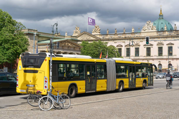 Berlin, Germany – May 28, 2022: Bus of line 100 at a traffic light at the German historical museum in Berlin